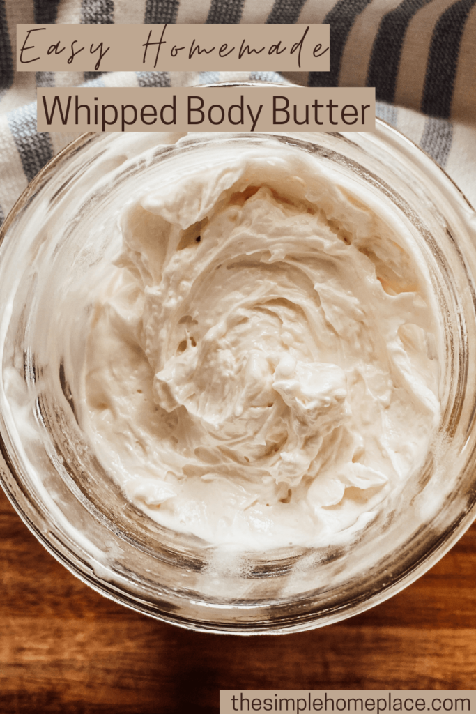 jar of whipped body butter on a wood surface