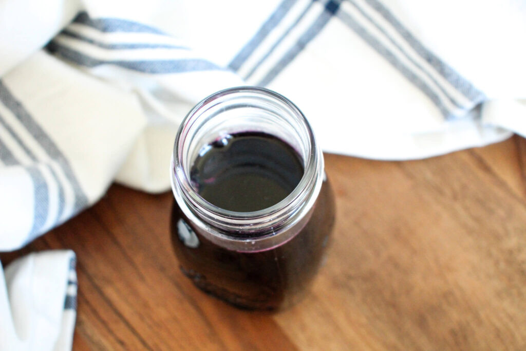sugar free blueberry syrup in a glass jar